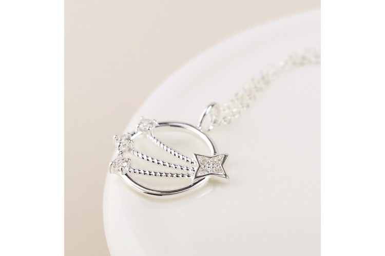 Sterling silver circle and shooting star necklace