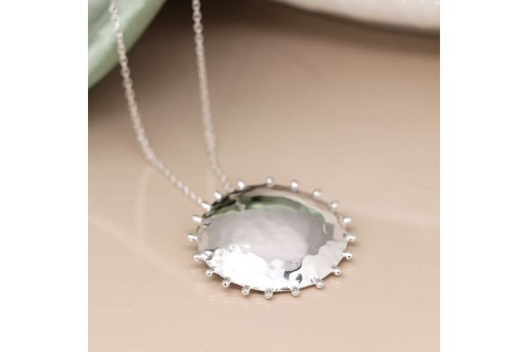 Sterling silver hammered sun disc necklace
