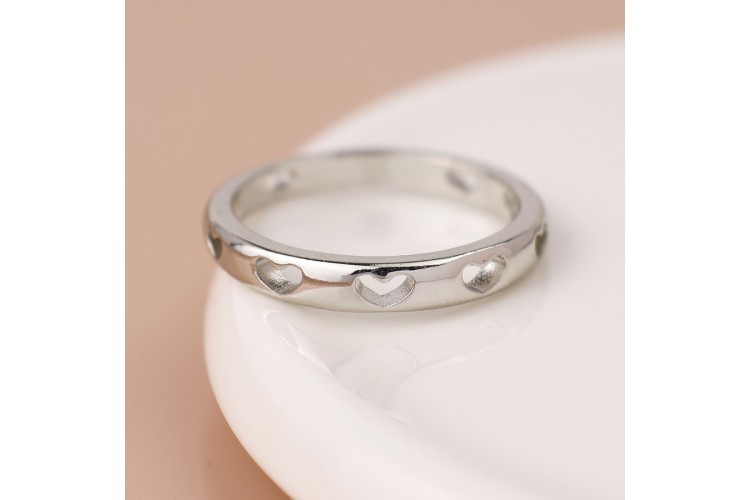 White gold plated heart cut-out ring.