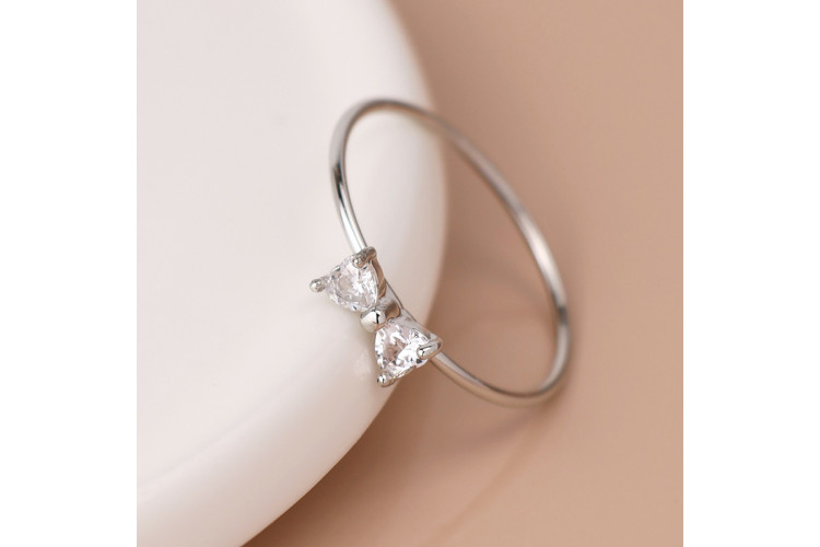 White gold plated simple crystal bow ring.